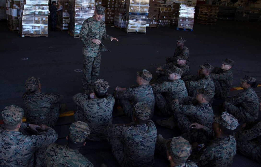 U.S. Marine Maj. Gen. Vincent Coglianese speaks with Marines and sailors from Combat Logistics Battalion 15, 15th Marine Expeditionary Unit, during a visit aboard USS Essex (LHD 2) at Naval Base San Diego Jan. 24, 2015. Coglianese is the commanding general of 1st Marine Logistics Group. (U.S. Marine Corps photo by Cpl. Elize McKelvey/Released)