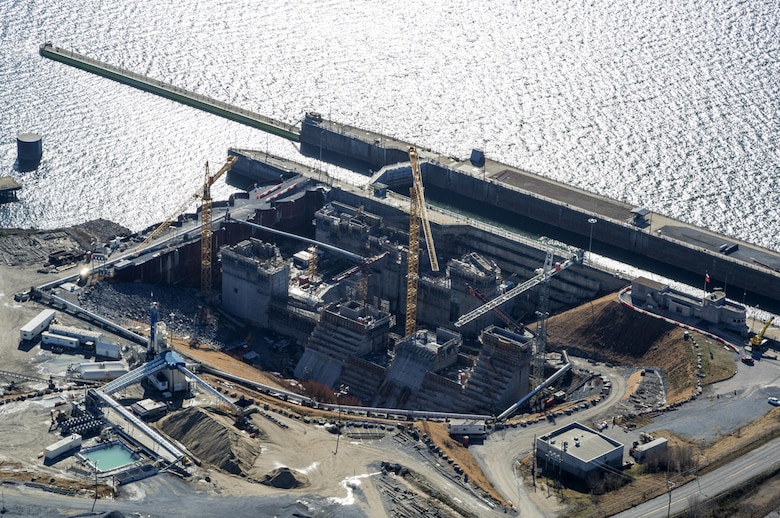 The U.S. Army Corps of Engineers Nashville District continues its construction at the Kentucky Lock Addition Project on the Tennessee River in Grand Rivers, Ky., Dec. 16, 2014. The Corps reached a significant milestone by topping off the first massive monolith in January 2015.