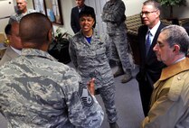Maj. Gen. Stayce Harris, 22nd Air Force commander, Brad Bentley, Truckload Carriers Associations president, David Money, Professional Truck Driver Institutes board of directors member, speak with Chief Master Sgt. Leonard Howard, 622nd Civil Engineer Group expeditionary combat support training and certification center commandant, during the at Dobbins Air Reserve Base, Ga. Jan. 23, 2015. The ECS-TCC held their military and industry tractor trailer training program capstone event and graduation where students received certification from the Professional Truck Drivers Institute. (U.S. Air Force photo/Senior Airman Daniel Phelps)