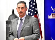 David Money, Professional Truck Driver Institutes board of directors member, speaks to members of Dobbins Air Force Base, Ga. on the significance of the tractor trailer program and its Professional Truck Driver Institutes certification Jan. 23, 2015. PTDI certification will allow for graduates to have a more seamless transition from military to civilian employment. (U.S. Air Force photo/Senior Airman Daniel Phelps)