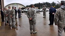 Chief Master Sgt. Leonard Howard, 622nd Civil Engineer Group expeditionary combat support training and certification center commandant, speaks to guests of the ECS-TCC military and industry tractor trailer training program capstone event at Dobbins Air Reserve Base, Ga. Jan. 23, 2015. Students who go through the course at Dobbins receive certification from the Professional Truck Drivers Institute. (U.S. Air Force photo/Senior Airman Daniel Phelps)