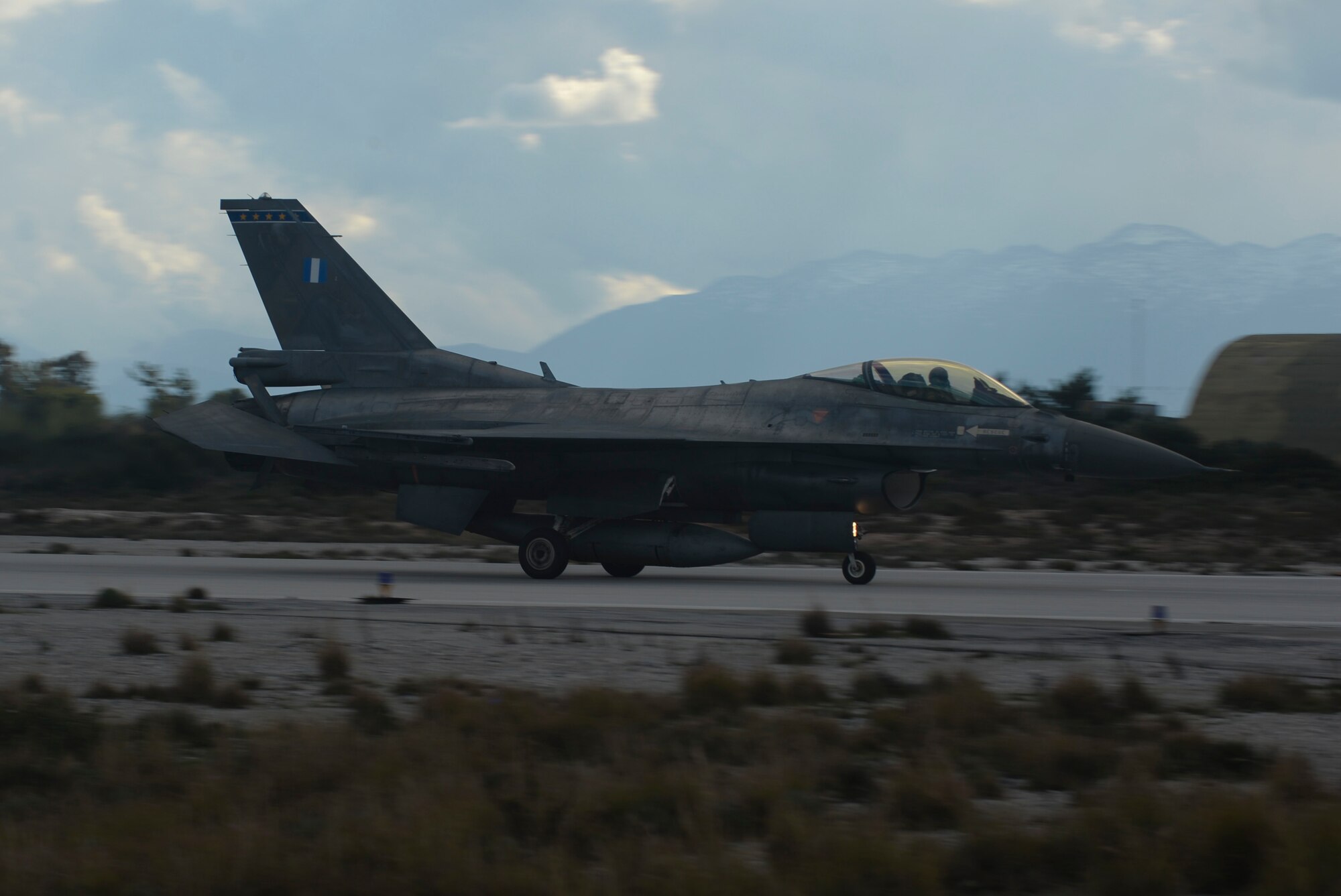 A Hellenic air force F-16 Fighting Falcon fighter aircraft from the 343rd Fighter Squadron lands on the flightline at Souda Bay, Greece, Jan. 26, 2015. The aircraft flew during training operations as part of a flying training deployment between the Greek and U.S. Air Forces at Souda Bay Jan. 16-Feb. 13, 2015.  (U.S. Air Force photo by Staff Sgt. Joe W. McFadden/Released)