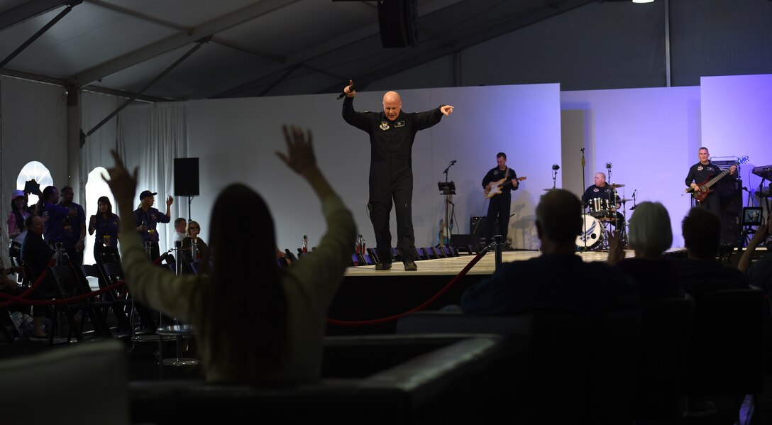 Senior Master Sgt. Ryan L. Carson, U.S. Air Force Band Max Impact vocalist, performs at Fan Fest in Scottsdale Az., Jan. 26, 2015.  The week-long entertainment, food and fashion event is home to Entertainment Sports and Programming Network's live broadcast for Super Bowl XLIX. (U.S. Air Force photo by/ Senior Airman Nesha Humes)