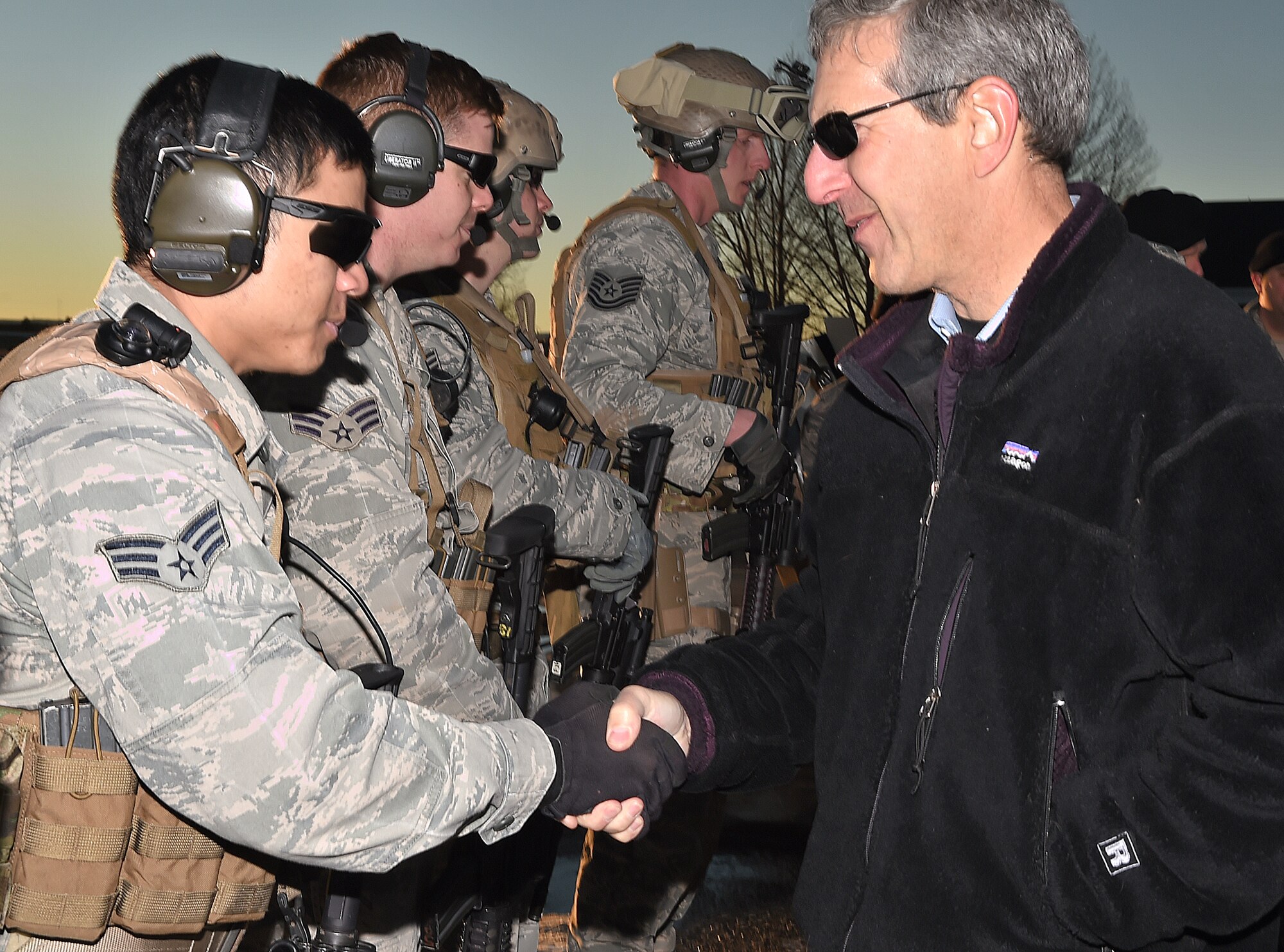 Alan Estevez, principal deputy under secretary of defense for acquisition, technology and logistics, visits with members of the 90th Security Group’s Tactical Response Force following a demonstration at Launch Facility Trainer Uniform-01 on F.E. Warren Air Force Base, Wyo., Jan. 14, 2015. Estevez was visiting the 90th Missile Wing to learn about logistical issues impacting the ICBM mission. (U.S. Air Force photo/R.J. Oriez)