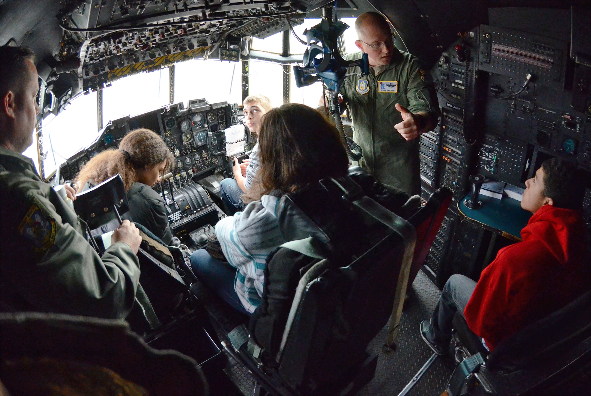 Members of the JROTC program at Colonial High School in Orlando toured the 920th Rescue Wing here Jan. 16. Pictured, several cadets take in the view from the flight deck of one of the wing's HC-130P/N King aircraft. (U.S. Air Force photo/Master Sgt. Paul Flipse)