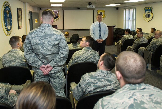 Retired Chief Master Sgt. James Roy, 16th Chief Master Sgt. of the Air Force, speaks with Airmen from Joint Base Charleston, S.C., who are attending Airmen Leadership School Jan. 26, 2015. Roy spoke about how to best serve in the United States Air Force and answered questions from the Airmen at the end. Roy plans to meet with every ALS class his schedule allows for. (U.S. Air Force photo/ Senior Airman Dennis Sloan)
