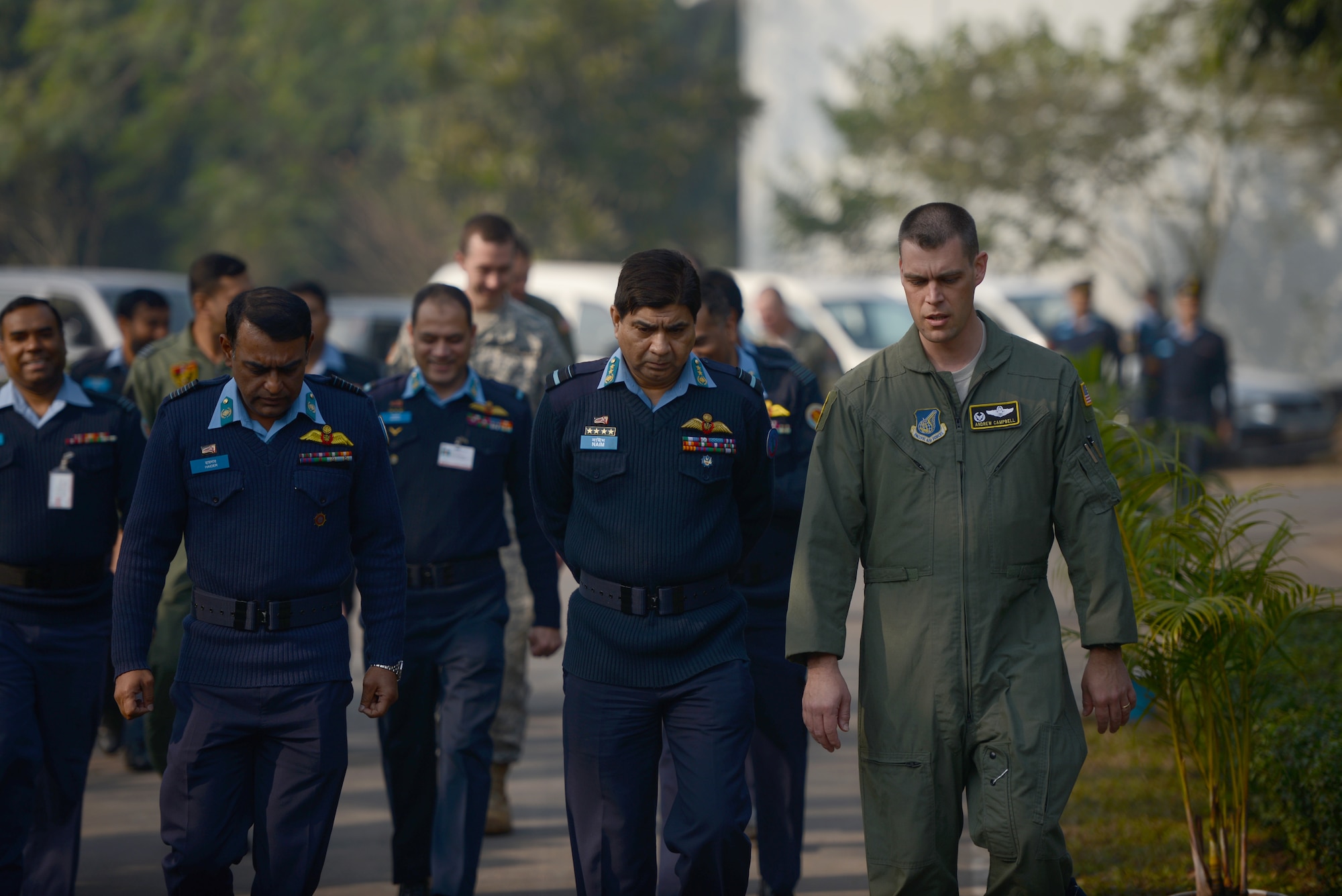 Lt. Col. Andrew Campbell, right, 36th Airlift Squadron commander, talks with Bangladesh Air Force Air Vice Marshal M. Naim Hassan during Exercise COPE SOUTH at BAF Base Bangabandhu, Bangladesh, Jan. 24, 2015. COPE SOUTH helps cultivate common bonds, foster goodwill, and improve readiness and compatibility between members of the Bangladesh and U.S. Air Forces. (U.S. Air Force photo by 1st Lt. Jake Bailey/Released)