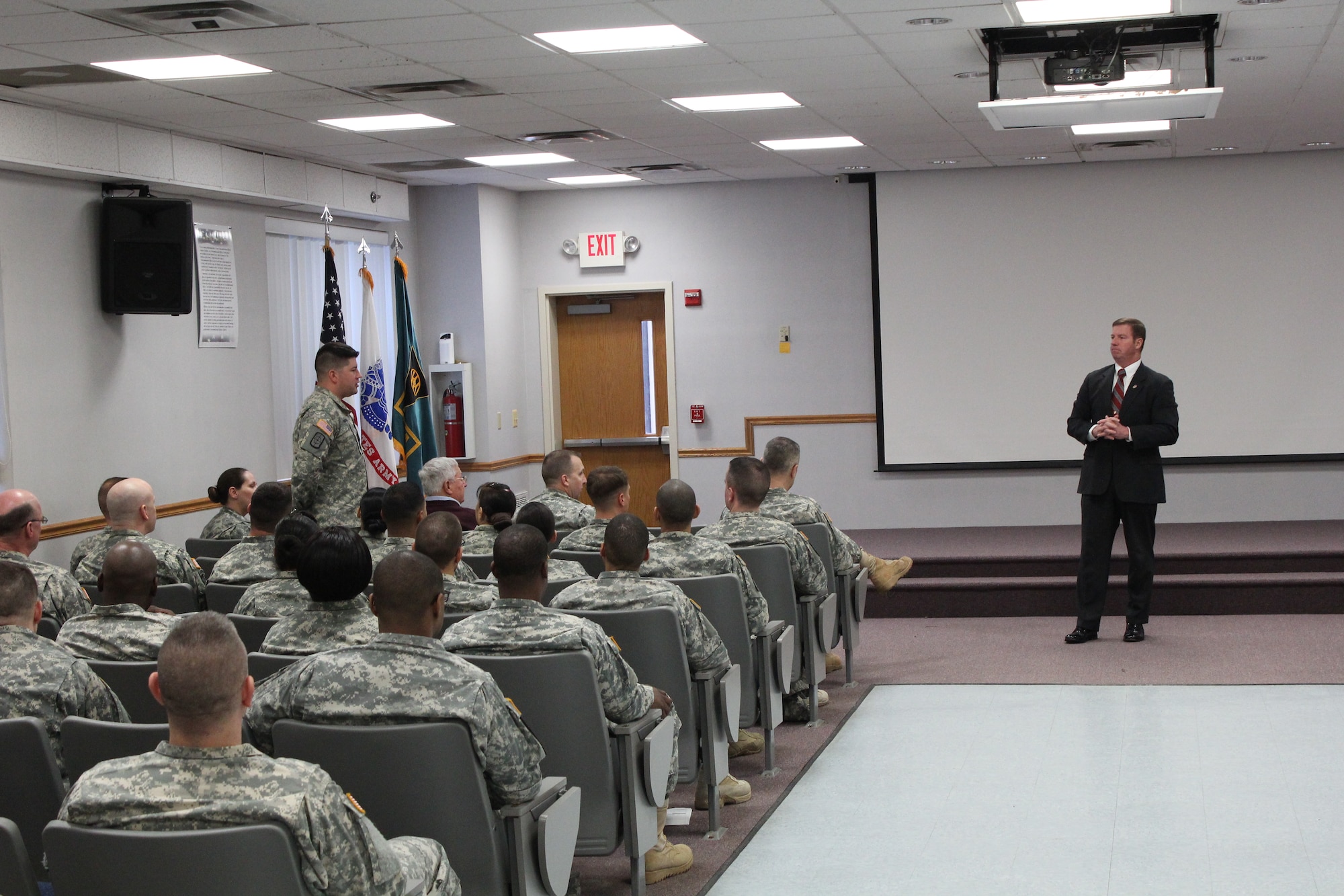 Staff Sgt. Christopher Novak (Left) addresses Kenneth Preston, former Sgt. Major of the Army (Right), about how he applies leadership to team building throughout his career at the Fort Dix NCO Academy on Joint Base McGuire-Dix-Lakehurst, N.J., Jan. 9, 2015. (U.S. Army photo by Sgt. 1st Class Aumtep Hill/Released)