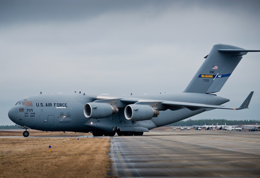 A 305th Air Mobility Wing C-17 Globemaster III from Joint Base McGuire-Dix-Lakehurst, N.J., taxies toward its parking destination Jan. 13, at Duke Field, Fla.  The aircrew picked up more than 100,000 pounds of ammunition from the 7th Special Forces Group during their stop.  (U.S. Air Force photo/Tech. Sgt. Sam King)