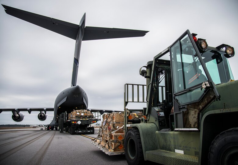 Another ammunition pallet waits to go onto the C-17 Globemaster III Jan. 13 at Duke Field, Fla.  The 96th Logistics Readiness Squadron’s aerial operations crew loaded more than 100,000 pounds of ammunition from the 7th Special Forces Group onto the aircraft during the upload.  (U.S. Air Force photo/Tech. Sgt. Sam King)