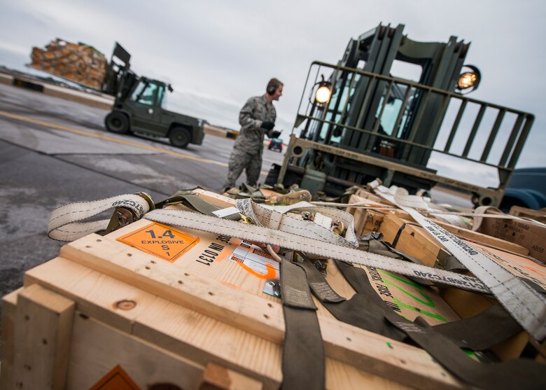 A pallet of ammunition sits ready for loading as another pallet is moved into place Jan. 13 at Duke Field, Fla.  The 96th Logistics Readiness Squadron’s aerial operations crew loaded more than 100,000 pounds of ammunition from the 7th Special Forces Group onto the aircraft during the upload.  (U.S. Air Force photo/Tech. Sgt. Sam King)