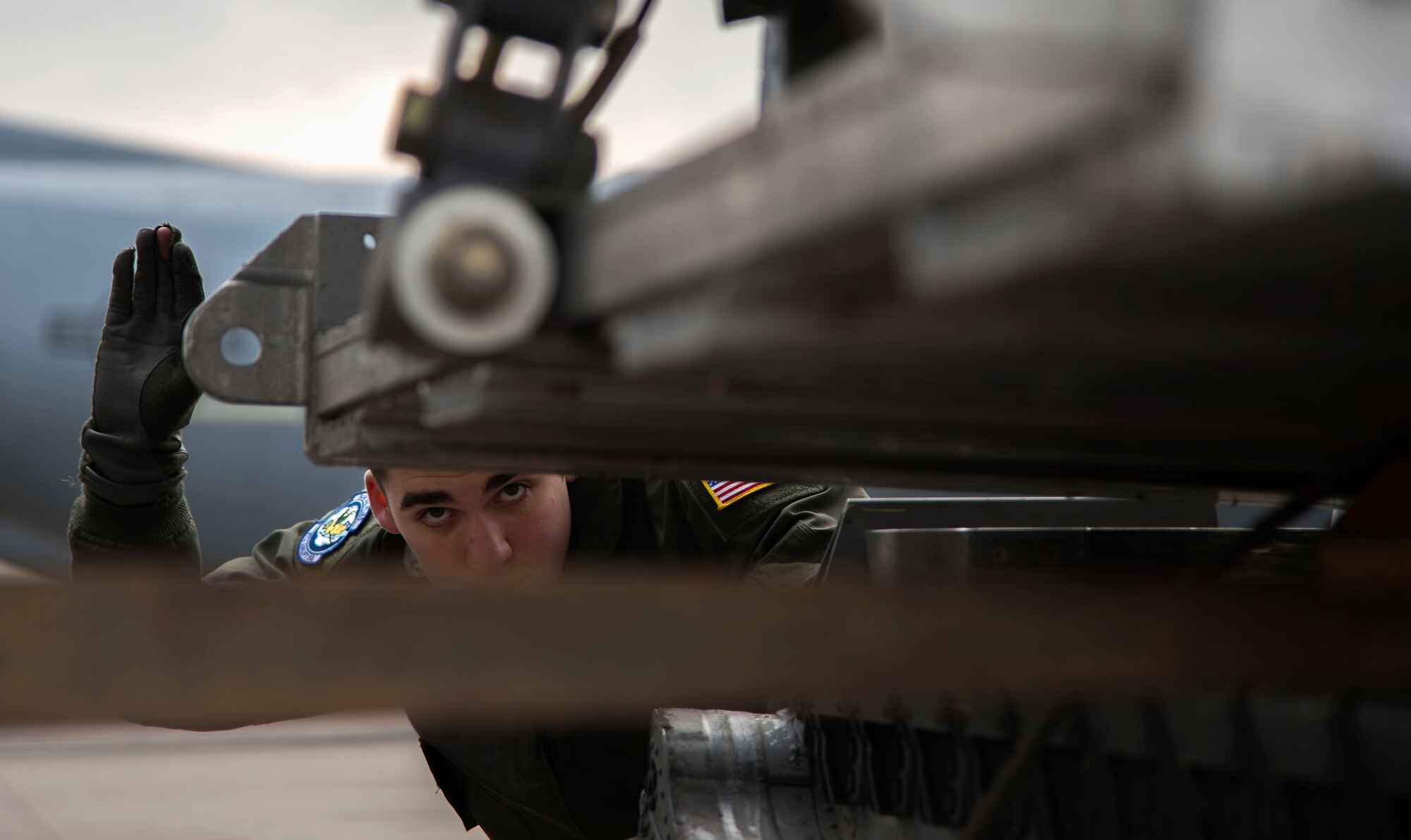 Airman 1st Class Dylan Arnt, 37th Airlift Squadron loadmaster, guides a forklift as it places a pallet onto the ramp of a C-130J Super Hercules at Ramstein Air Base, Germany, Jan. 20, 2015. Cargo loaded into a C-130J must be carefully placed on the ramp to ensure no damage occurs to it or the aircraft. (U.S. Air Force photo/Senior Airman Damon Kasberg)