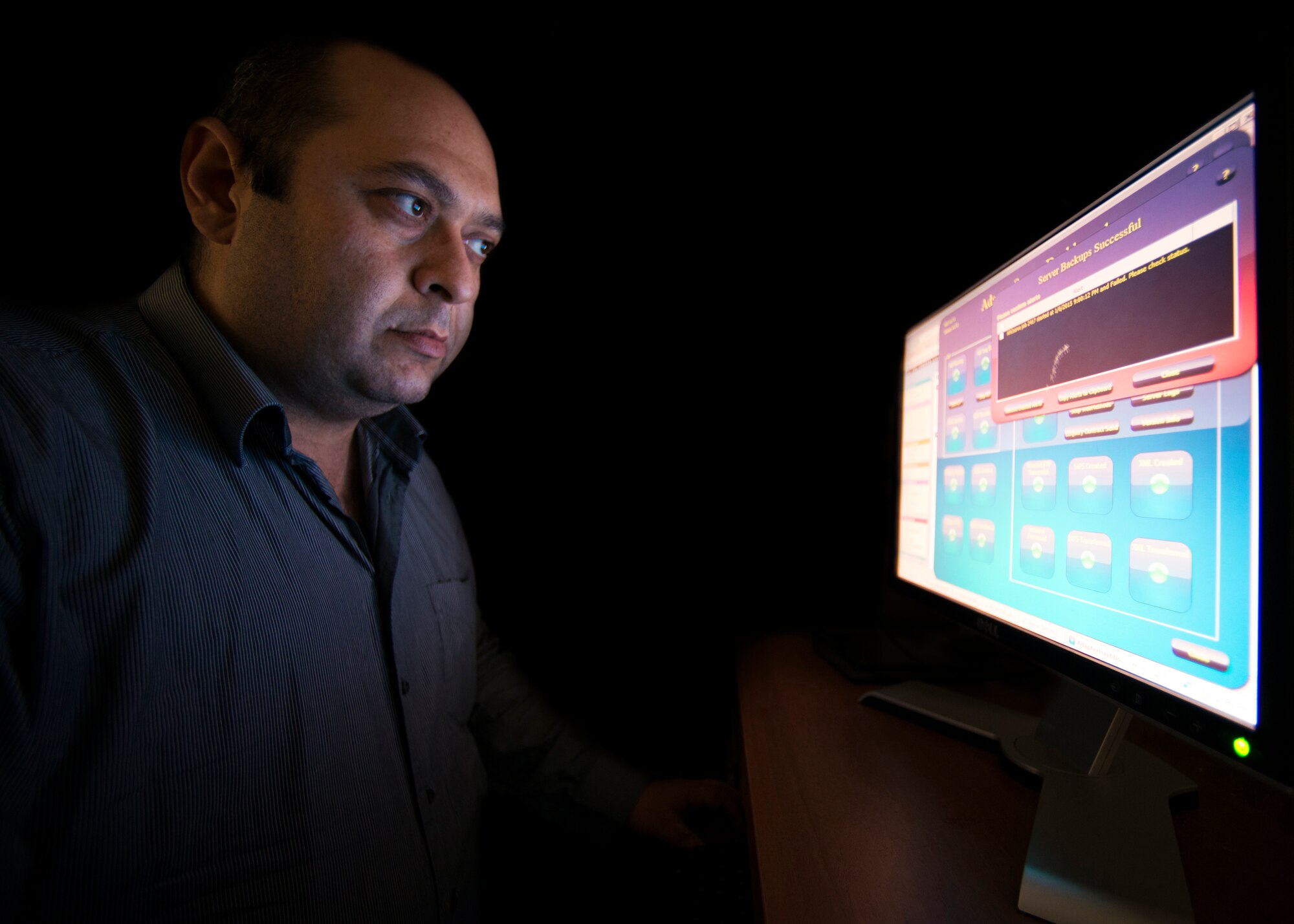 Macit Ipekbayrak, 39th Contracting Squadron contracting systems specialist, backs up a server Jan. 8, 2015, at Incirlik Air Base, Turkey. The 39th CONS has their own server which contains every transaction and data used for each contact here. (U.S. Air Force photo by Airman Cory W. Bush/Released)
