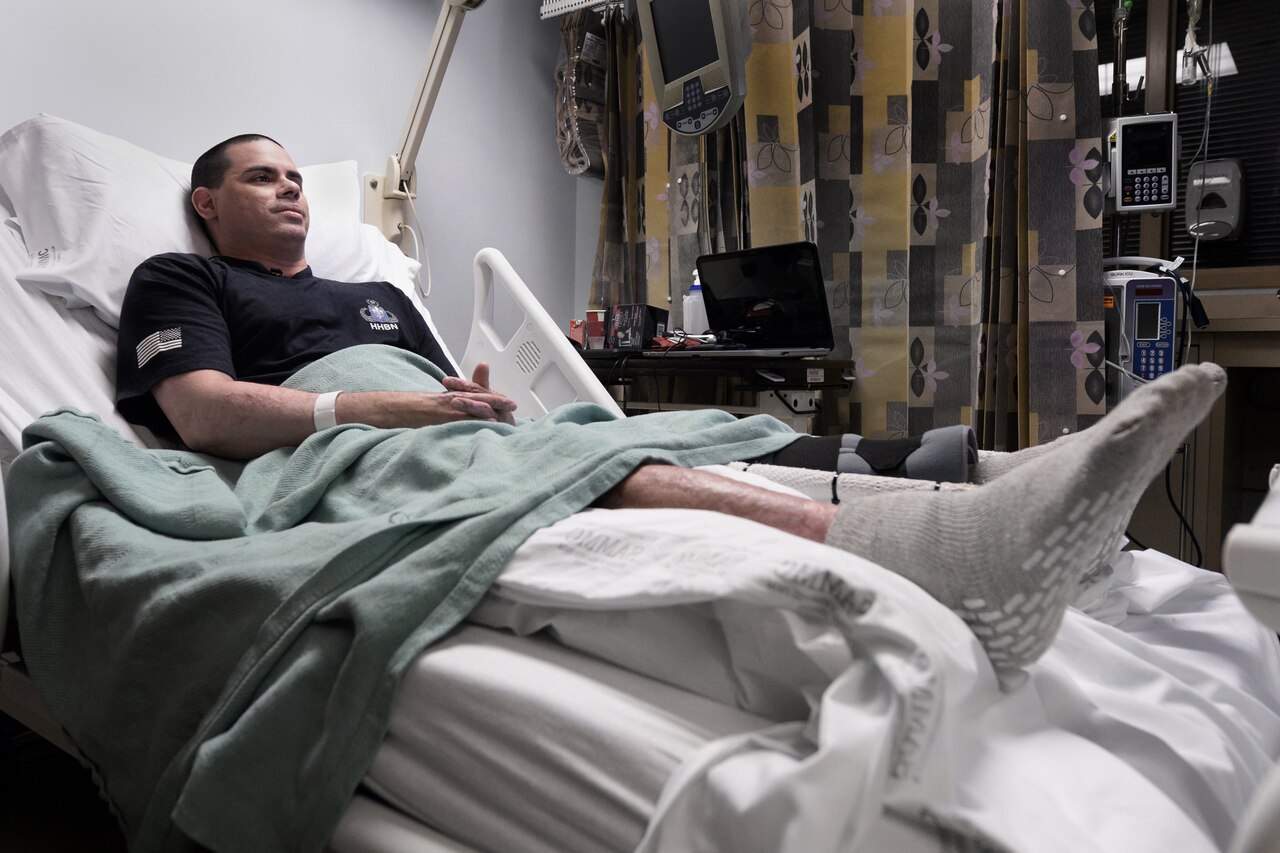 Army Master Sgt. Matthew Deller recovers from his 14th skin graft procedure at the U.S. Army Institute of Surgical Research Burn Center at the San Antonio Military Medical Center on Joint Base San Antonio-Fort Sam Houston, Texas. Jan. 13, 2015. Deller suffered burns to 77 percent of his body and required blood transfusions following skin graft procedures. DoD photo by EJ Hersom