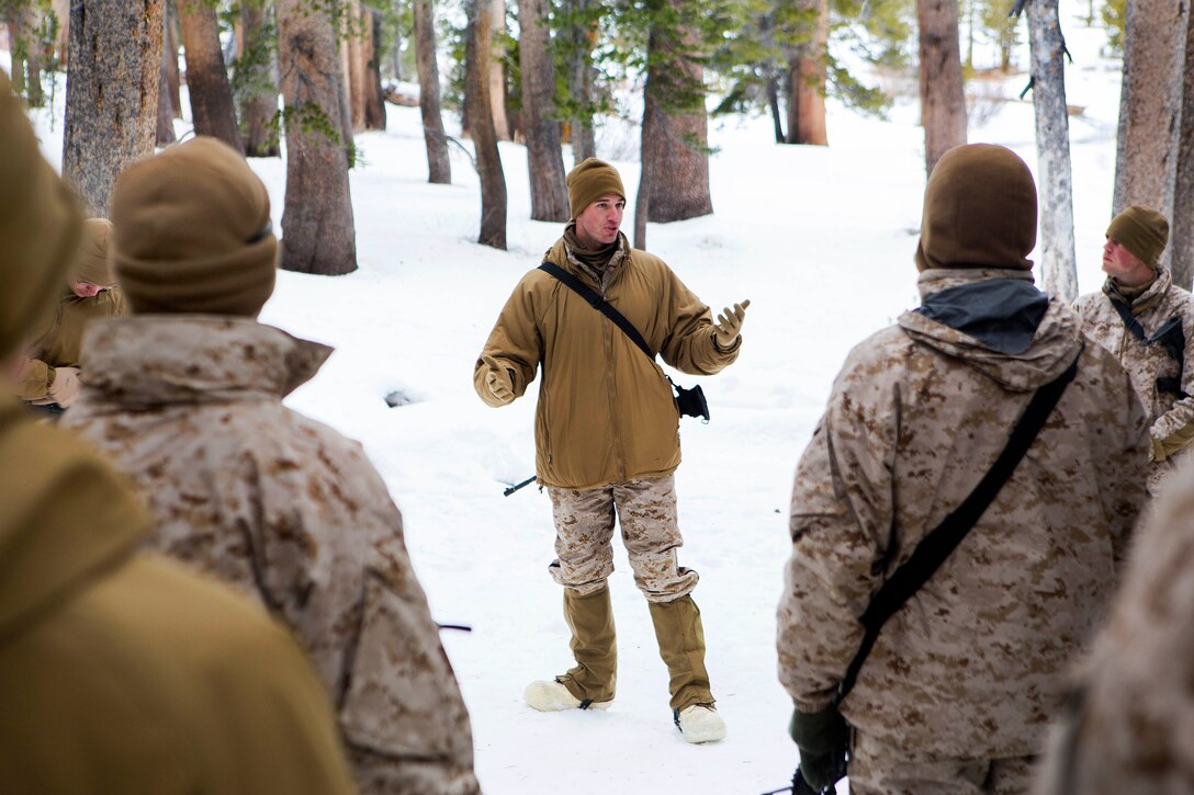 Marine Corps 1st Lt. Tyler Stratton, center,  conducts a class on improvised explosive devices at the U.S. Marine Corps Mountain Warfare Training Center in Bridgeport, Calif., Jan. 22, 2015. Stratton is assigned to the Combat Logistics Battalion 26, 2nd Marine Logistics Group. The training center trains Marines across the warfighting functions for operations in mountainous, high altitude and cold weather environments.