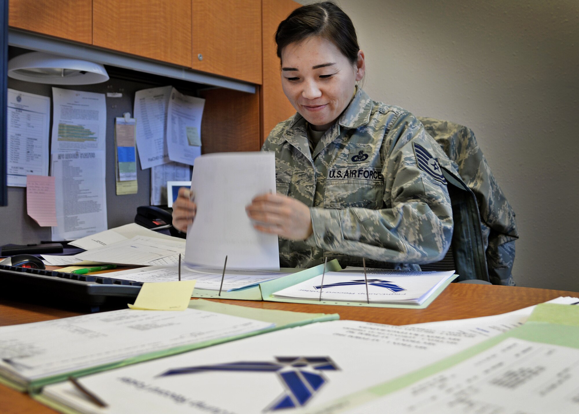 A U.S. Air Force Air Commando maintains records within the 27th Special Operations Group Host Aviation Resource Management office Jan. 9, 2015 at Cannon Air Force Base, N.M. The 27th SOG was recently announced as the winners of the 2014 Aviation Resource Management Award for large unit. (U.S. Air Force photo/Airman 1st Class Chip Slack)