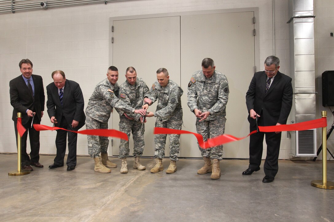 Col. Richard A. Pratt, commander, Tulsa District, U.S. Army Corps of Engineers (third from left), joined leaders from Fort Sill, and the Air Defense Artillery community to cut the ribbon for the new Lt. Gen. LeVan Terminal High Altitude Area Defense Instructional Facility, Jan. 23. The $27 million dollar facility will train approximately 200 students a year on the THAAD weapon system.