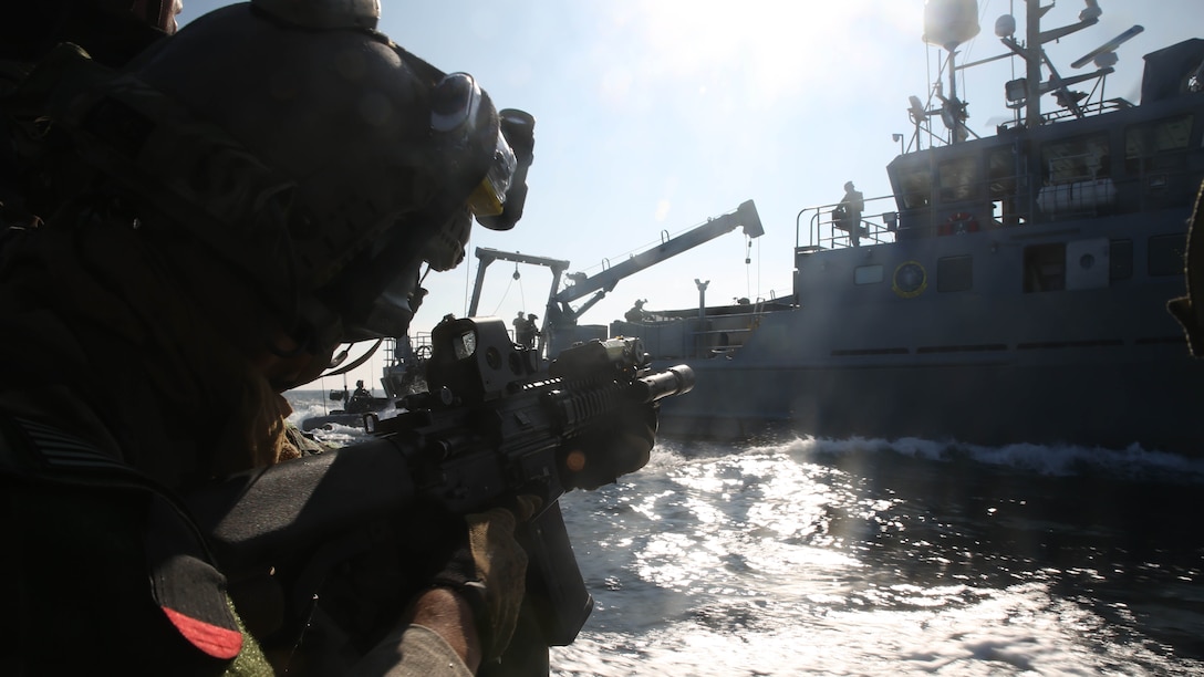 Marine Special Operations Teams with Bravo Company, 1st Marine Special Operations Battalion, U.S. Marine Corps Forces Special Operations Command, prepare to board a target vessel during Visit, Board, Search and Seizure training near Naval Base Coronado, Calif., Jan. 16. 