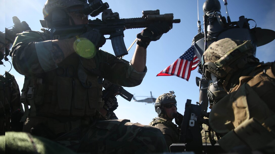 Critical Skills Operators with Bravo Company, 1st Marine Special Operations Battalion, U.S. Marine Corps Forces Special Operations Command, prepare to board a target vessel during Visit, Board, Search and Seizure training near Naval Base Coronado, Calif., Jan. 14. 
