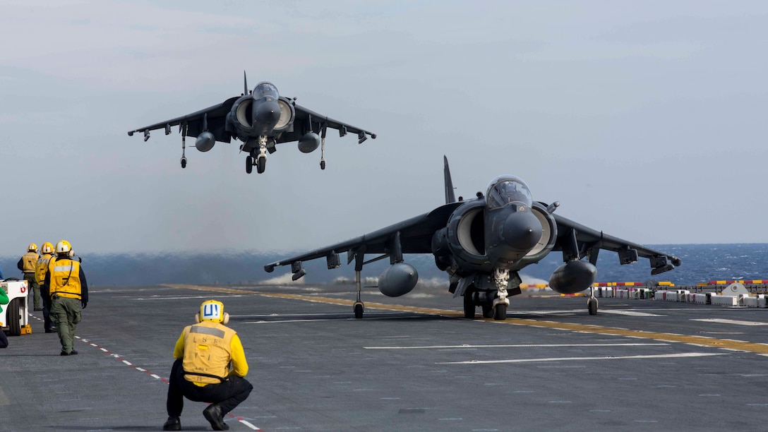 An AV-8B Harrier lands on the flight deck of the amphibious assault ship USS Kearsarge (LHD 3). Kearsarge is underway conducting Afloat Training Group basic phase training. 