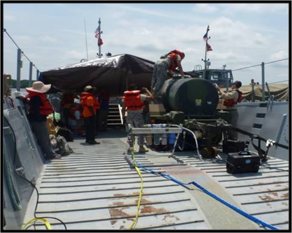 Monitoring physical water quality parameters on the James River using pre- and post-water diagnostics operations gear with portable water treatment systems. Water Treatment took place in the middle of the river on an Army Landing Craft Utility.
