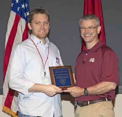 ERDC-GSL Director David Pittman (right) presented Robert Browning IV with the 2014 Young Engineer of the Year for the Mississippi Section of the American Society of Civil Engineers. 