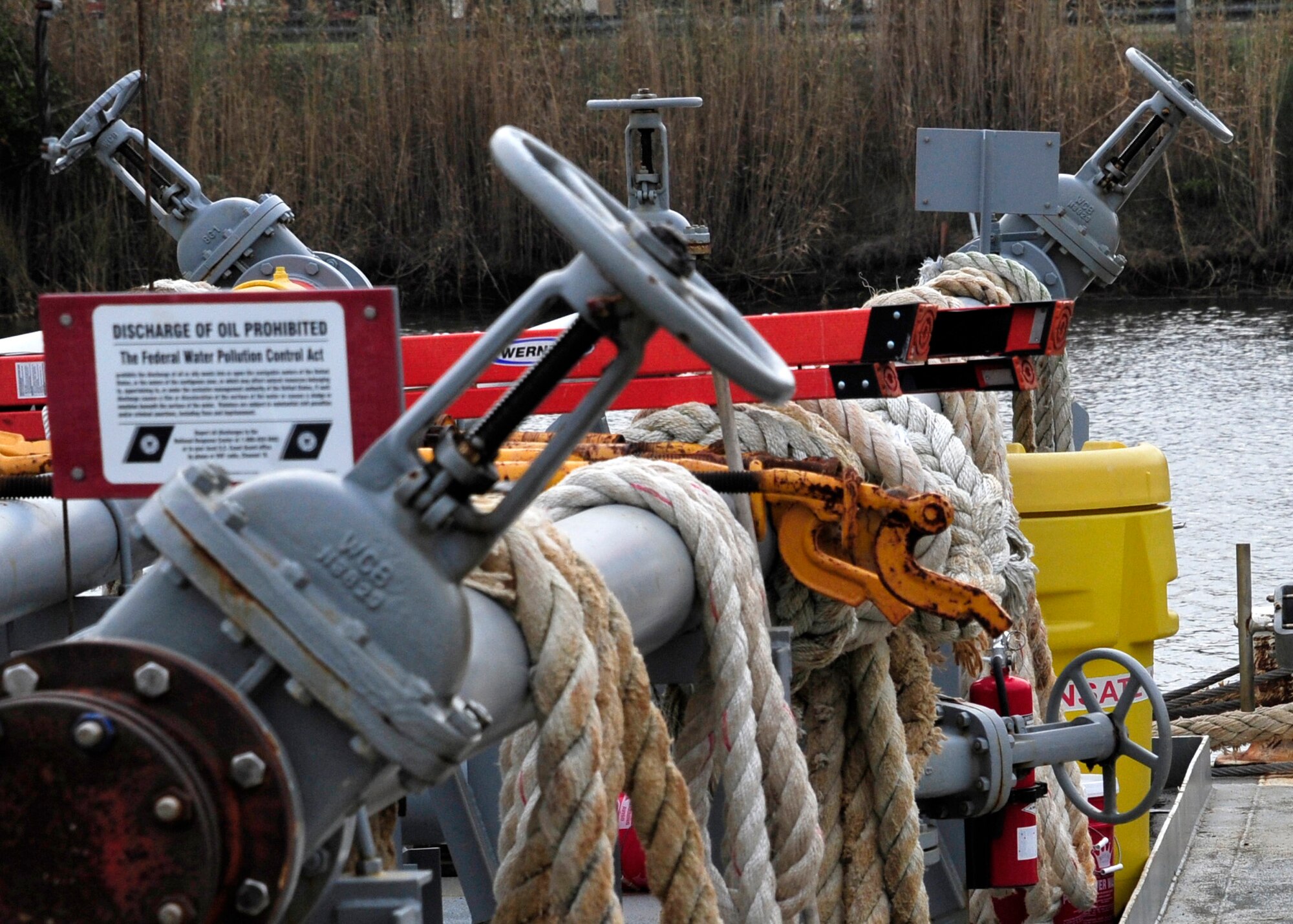 Fuel valves and mooring lines hang on the deck of a fuel barge at the Weekly Bayou fuel ramp on Eglin Air Force Base, Fla., Jan. 15.