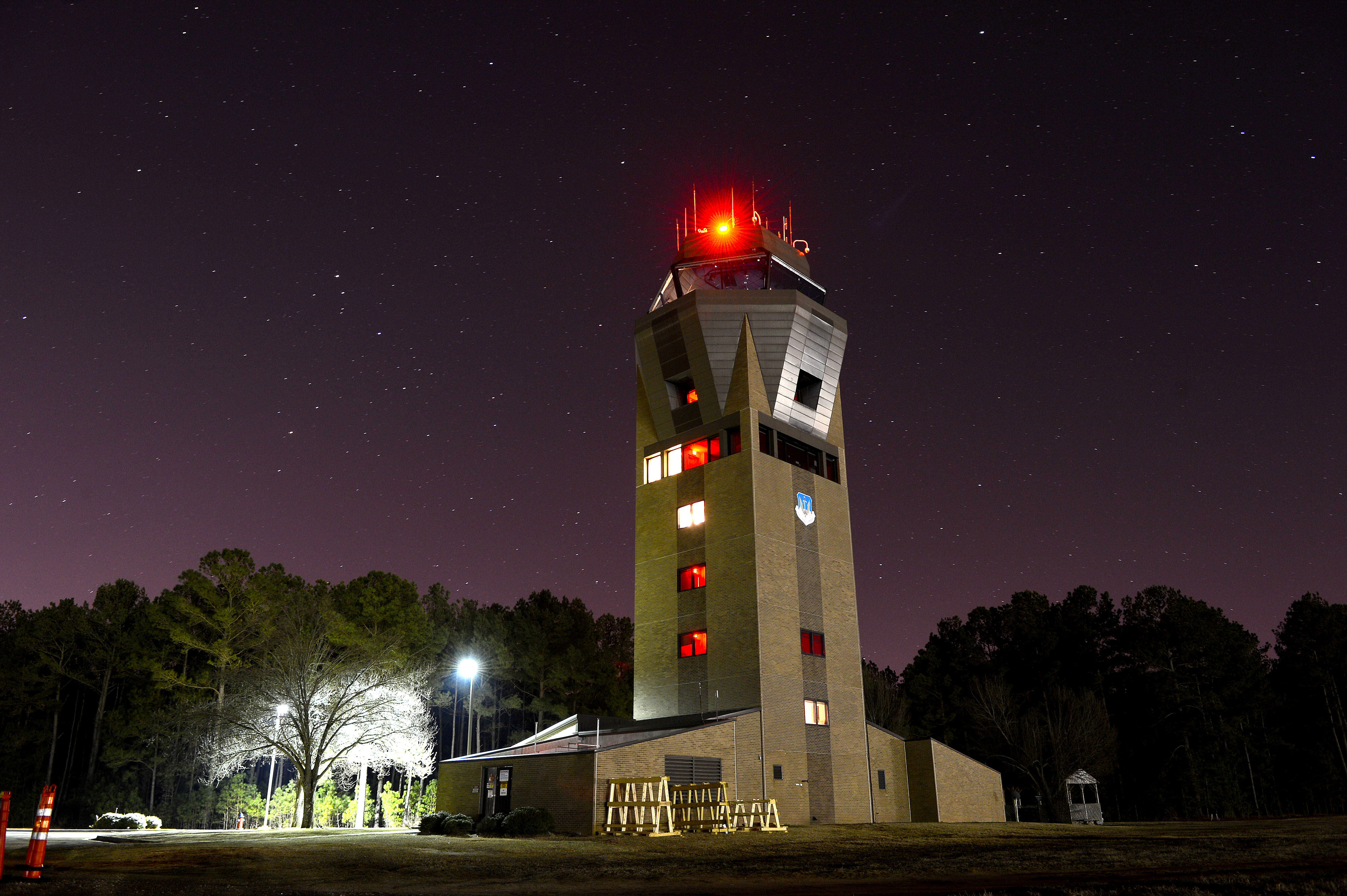 20 OSS tower illuminates the night