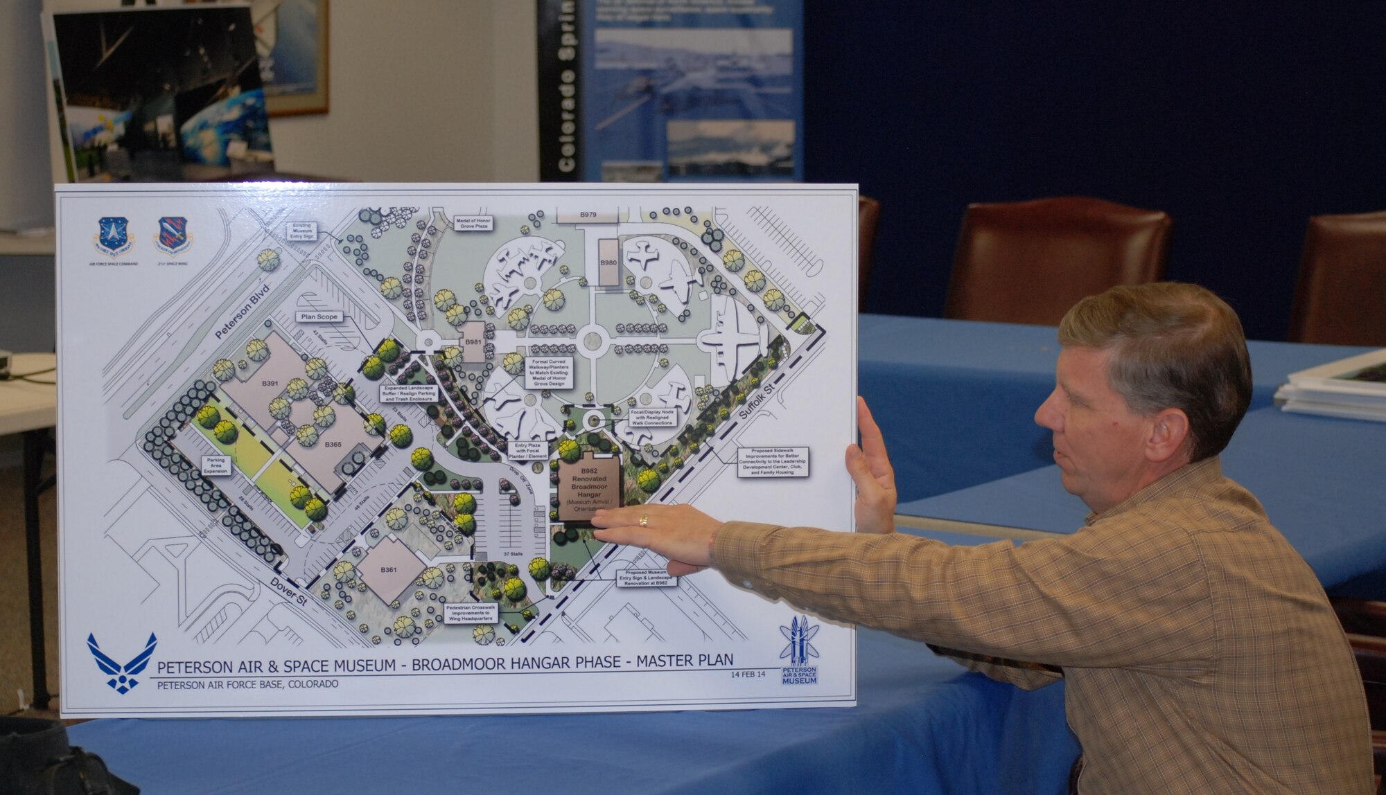 PETERSON AIR FORCE BASE, Colo. -- Jeffrey Nash, Peterson Air and Space Museum assistant director and curator, points out proposed changes to the outside area of the facility. Walkways, landscaping and other work will better tie in the various areas of the museum. (U.S. Air Force photo by Dave Smith)