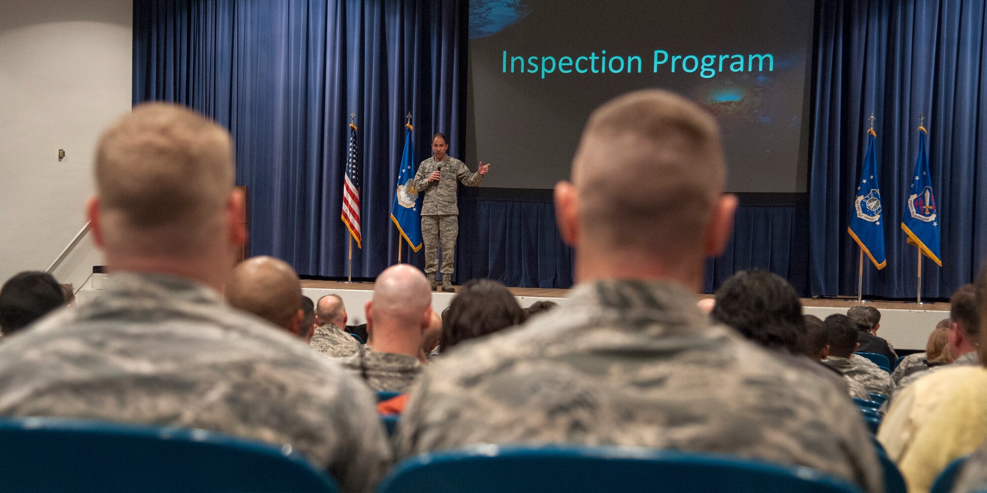 PETERSON AIR FORCE BASE, Colo. – Col. John Shaw, 21st Space Wing commander, addresses the audience during one of the two commander’s call held Jan. 20 at the base auditorium. Shaw addressed several important topics including safety, law and order, and the wing’s unit effectiveness inspection, scheduled for May 10-19. (U.S. Air Force photo by Craig Denton)