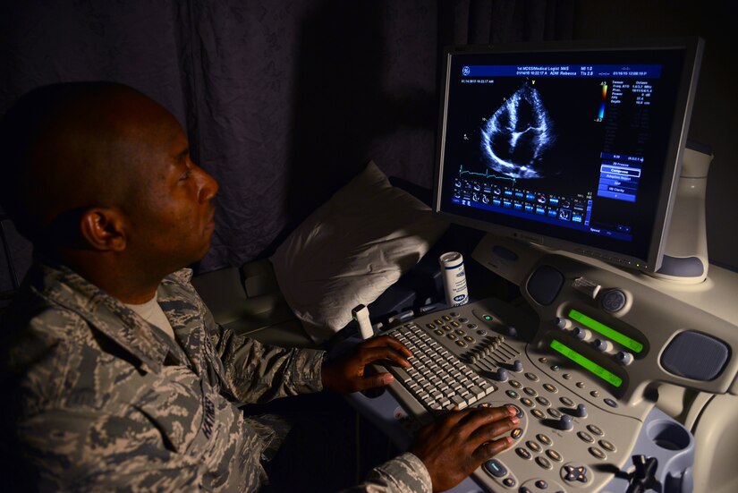 U.S. Air Force Staff Sgt. Arjune Haynes, 633rd Medical Operations Squadron cardiopulmonary services assistant noncommissioned officer in charge, reviews an echocardiogram at Langley Air Force Base, Va., Jan. 16, 2015. Haynes, originally from Trujillo, Panama, was inspired to join a branch of the U.S. Armed Forces after a life-changing encounter with a Service member during Operation Just Cause in 1989. (U.S. Air Force photo illustration by Senior Airman Aubrey White/Released) 