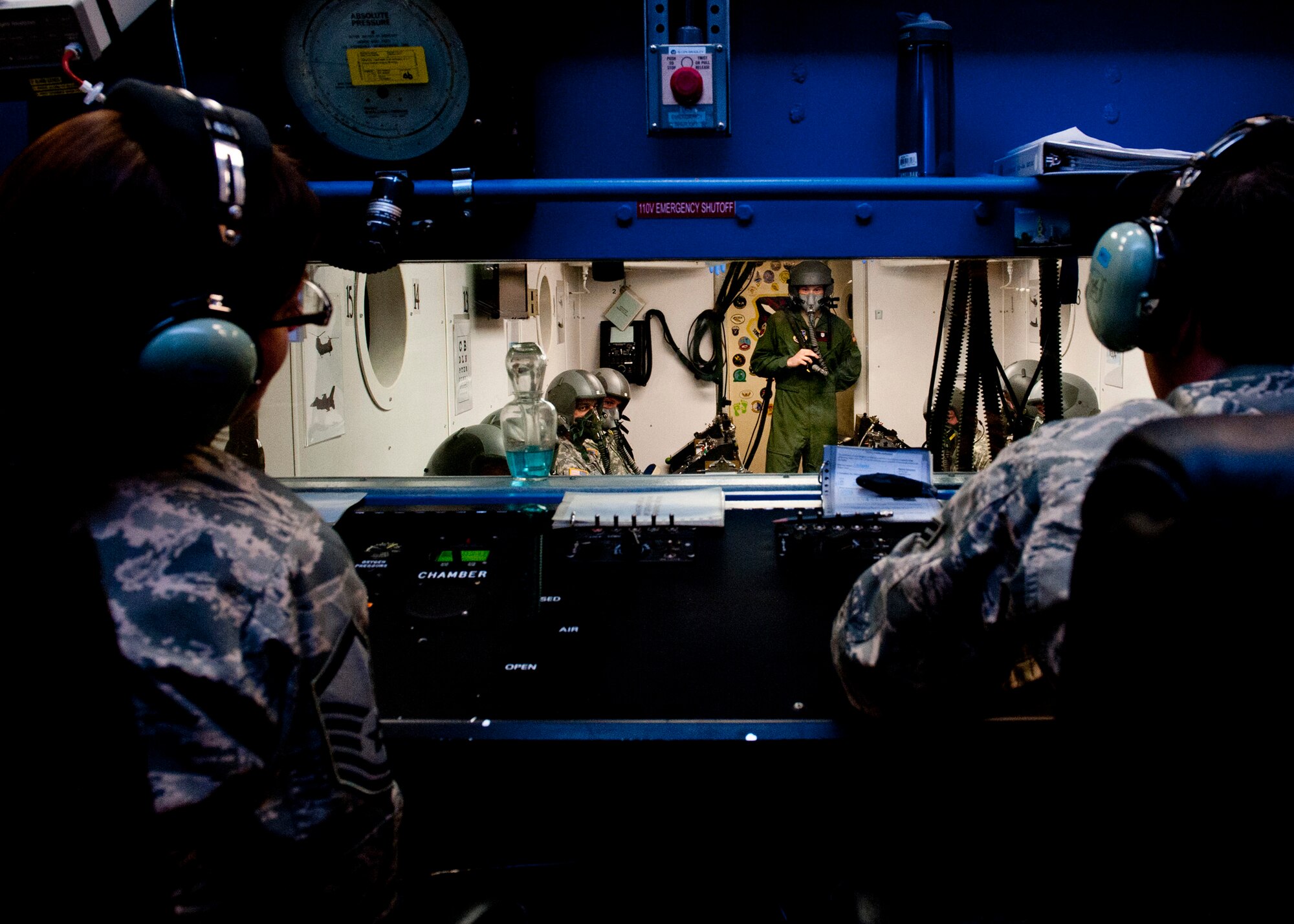 PETERSON AIR FORCE BASE, Colo. – Members of 21st Aerospace and Operational Physiology instruct a high-altitude training class to Soldiers from Fort Carson’s 10th Special Forces Group in the altitude chamber, Jan. 15, 2015. During the altitude training course, participants experience the effects of a low-pressure environment and the subtle effects of hypoxia or oxygen deprivation. (U.S. Air Force photo by Senior Airman Tiffany DeNault)