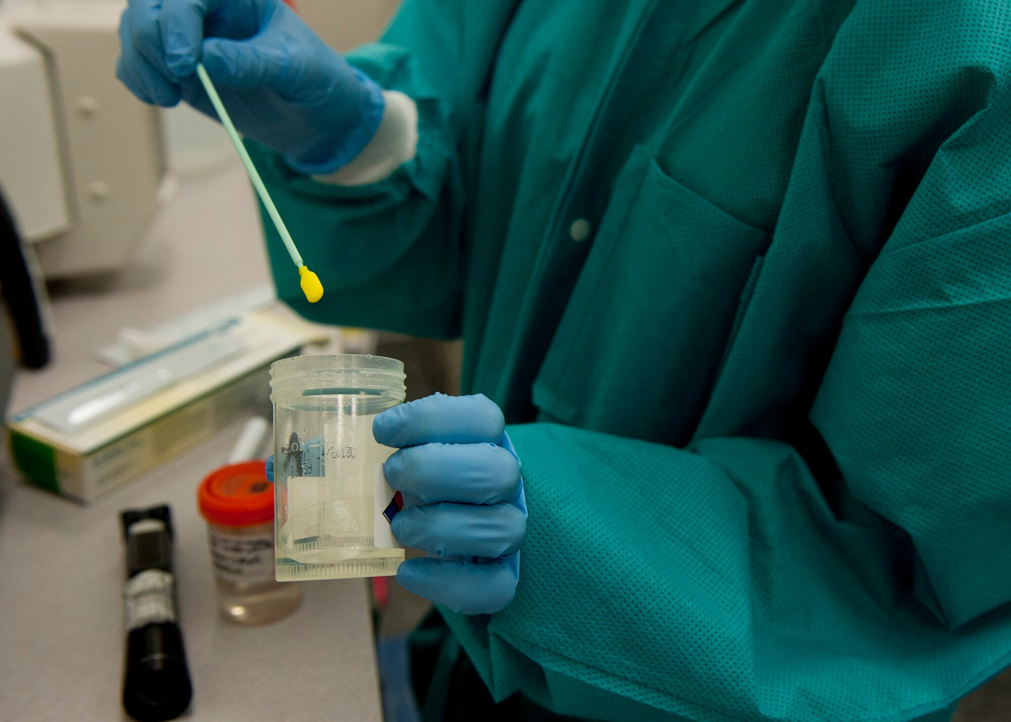 PETERSON AIR FORCE BASE, Colo. – Staff Sgt. Shannon Ford, 21st Medical Support Squadron medical laboratory technician, watches for color changes during a test on fluids in the medical laboratory Jan. 21, 2015. The laboratory is part of the 21st Medical Group and comprised of more than 500 medical professionals who provide healthcare and mission-readiness support for more than 25,000 active duty, retired and family members. (U.S. Air Force photo by Senior Airman Tiffany DeNault)