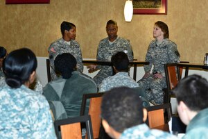 A panel of three U.S. Army senior noncommissioned officers sit on a panel during a Sisters-in-Arms forum at Fort Eustis, Va., Jan. 23, 2015. The panel spoke to the all-female crowd on the topic of ‘how to improve work performance.’ (U.S. Air Force photo by Senior Airman Kimberly Nagle/Released)