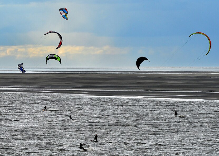 WRIGHT-PATTERSON AIR FORCE BASE, Ohio – Tech. Sgt. Frank Oliver, 445th Airlift Wing Public Affairs photographer, won in four categories of the 2014 Air Force Reserve Command Media Contest. He took first place in the Sports Photograph category for his photograph featuring Air Force personnel from Joint Base Elmendorf-Richardson, Alaska, windsurfing during their off-duty time over the summer. (U.S. Air Force photo/Tech. Sgt. Frank Oliver) 
