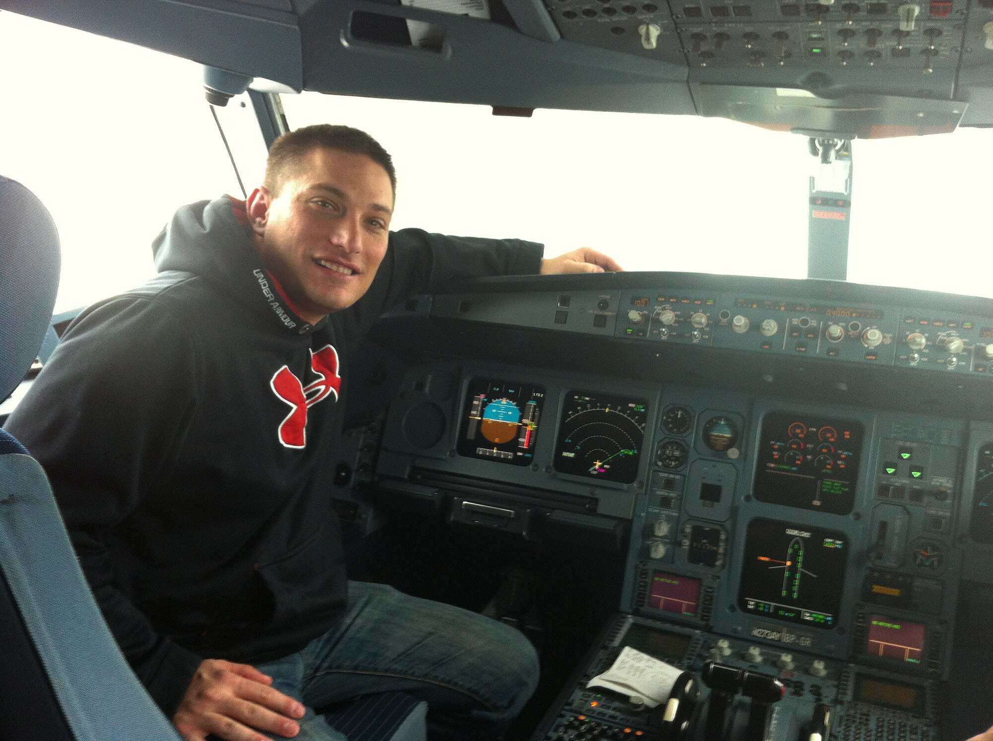 Master Sgt. Chad Tanner sits at the controls of an Airbus A330. Tanner, an Events Marketing NCO at Headquarters Air Force Recruiting Service, is achieving his dream of becoming a commercial airline pilot. (Courtesy photo)