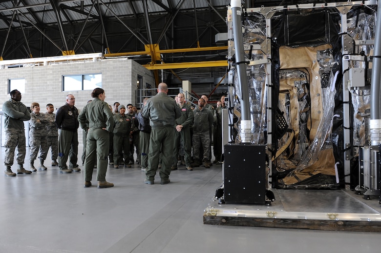 Members of the 375th and 932nd Aeromedical Evacuation Squadrons recieve training on the Transport Isolation System at Scott Air Force Base, Illinois, Jan. 26, 2015. The training was designed to familiarize members with the maintenance, set up and layout of the TIS and their responsibilities while using the system. (U.S. Air Force photo/Staff Sgt. Jonathan Fowler)