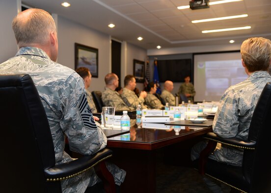 Chief Master Sgt. of the Air Force James Cody receives a mission brief with base leadership on Barksdale Air Force Base, La., Jan. 22, 2015. Cody visited the base as part of an opportunity to speak to and answer questions from base personnel on key issues affecting the Air Force. (U.S. Air Force photo/Senior Airman Joseph A. Pagán Jr.)