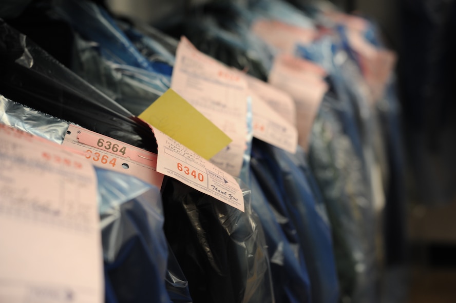Uniforms line the racks at the clothing alterations shop on Minot Air Force Base, N.D., Jan. 21, 2015. The shop is open Mondays, Wednesdays and Fridays from 9 a.m. to 5 p.m. and has an average turn-around time of one week for alterations and dry-cleaning. (U.S. Air Force photo/Senior Airman Stephanie Morris)