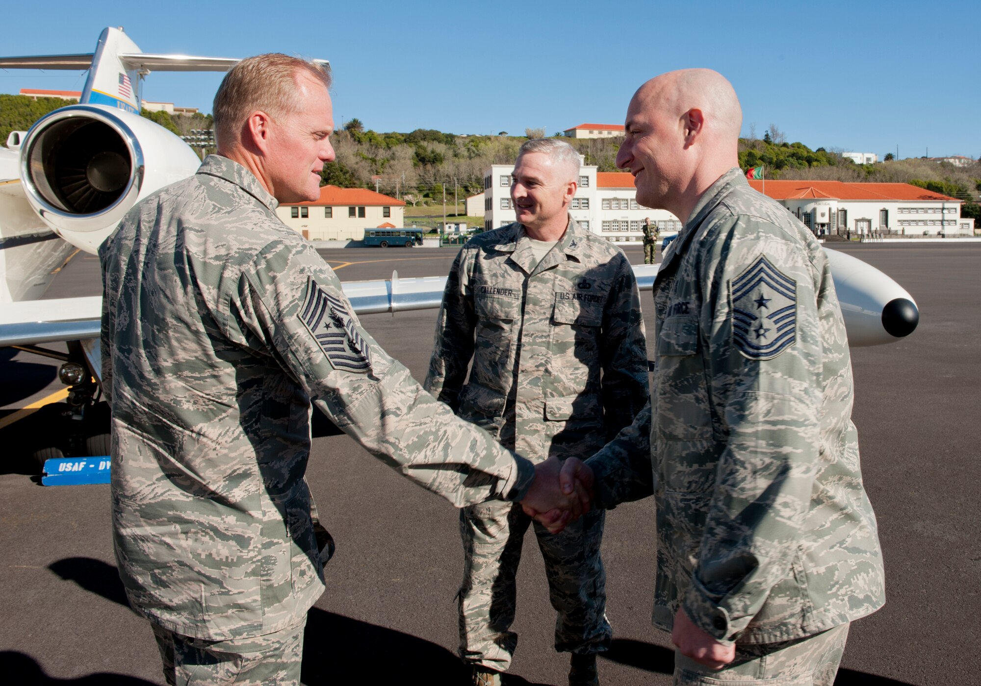 Chief Master Sgt. of the Air Force James A. Cody is greeted by Chief Master Sgt. David P. Klink, 65th ABW command chief, Lajes Field, Azores, Portugal, after arriving to the island on Jan. 26, 2015. Cody is currently on a tour of bases within the United States Air Forces in Europe command to express his gratitude to Airmen, listen to their concerns and answer their questions. (U.S. Air Force photo/Staff Sgt. Zachary Wolf/Released)