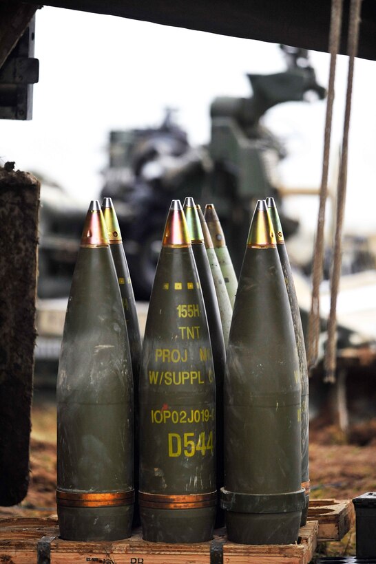 U.S. soldiers prepare 155 mm rounds for an M777 howitzer live-fire exercise at the 7th Army Joint Multinational Training Command’s Grafenwoehr Training Area, Germany, Jan. 23, 2015.
