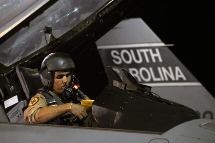 Capt. Ryan "Bago" Madrid, an F-16 Fighting Falcon pilot assigned to the 157th Fighter Squadron of the South Carolina Air National Guard prepares to launch from McEntire Joint National Guard Base enroute to an Air Expeditionary Force deployment to Southwest Asia, May 14, 2010.