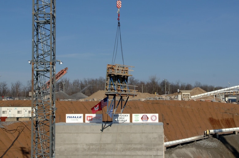 The last form is removed from the first completed massive monolith from a viewpoint over the construction site in Grand Rivers, Ky., Jan. 28, 2015. The U.S. Army Corps of Engineers Nashville District and contractor, Thalle Construction, participated in the event commemorating this first important milestone.