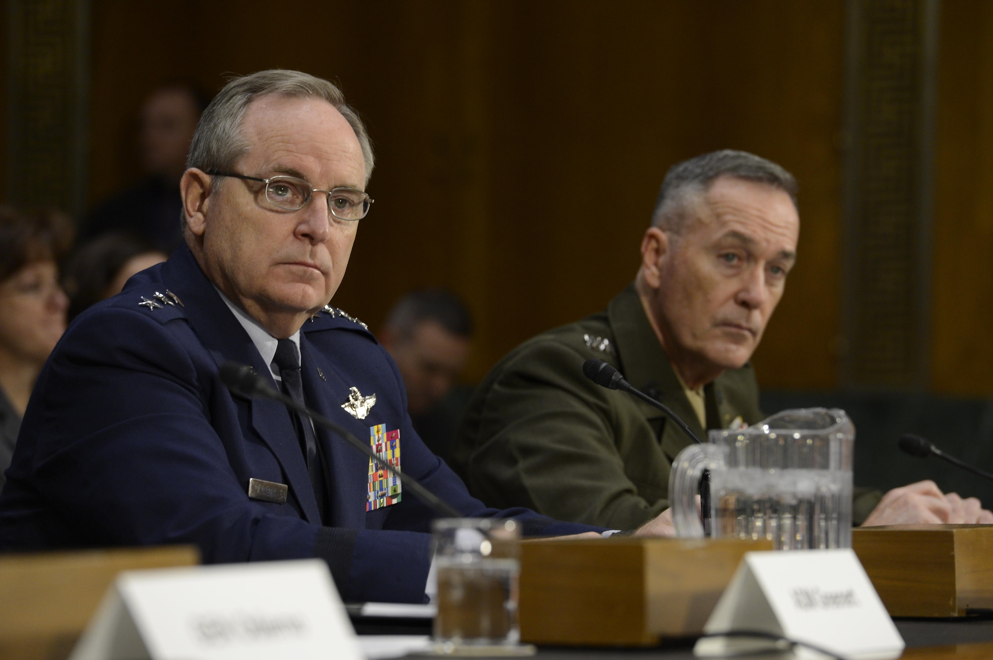 Air Force Chief of Staff Gen. Mark A. Welsh III testifies before the Senate Armed Services Committee Jan. 28, 2015, in Washington, D.C., as Commandant of the Marine Corps Gen. Joesph F. Dunford Jr., looks on. Other service leaders present during the hearing were Chief of Staff of the Army Gen. Raymond Odierno and Chief of Naval Operations Adm. Jonathan W. Greenert. (U.S. Air Force photo/Scott M. Ash)