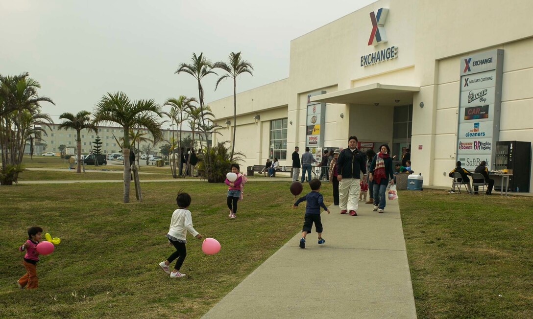 Kin Town residents leave the bases exchange Jan. 17 during Camp Hansen’s Friendship Saturday. Friendship Saturday is an event where community members are allowed on the base, unescorted but with passes, and enjoy some of the facilities on the camp. They visited various facilities including the Exchange, The Palms and bowling alley. Free balloons were handed out for children to enjoy during the event.