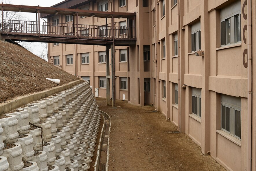 Buildling 930 is a collective protective shelter facility on Osan Air Base, Republic of Korea. The facility is used to house transient troops or ones temporarily assigned to Osan.(U.S. Air Force photo by Staff Sgt. Jake Barreiro)