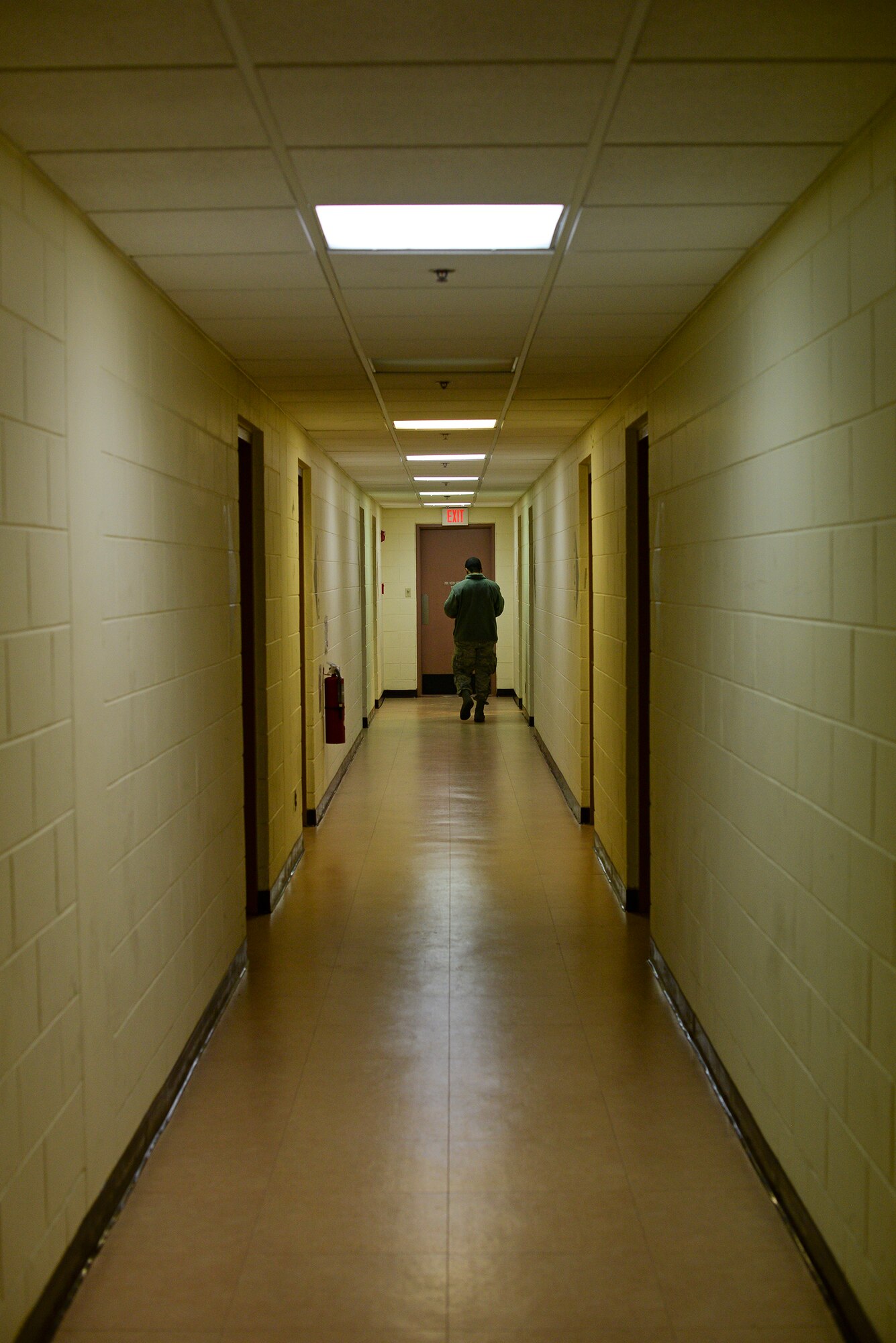 A 51 st Logistic Readienss Squadron Airman inspects the rooms in a collective protective shelter facility building 930 Jan. 23, 2015, at Osan Air Base, Republic of Korea. The facility is important for housing forces in a contingency. (U.S. Air Force photo by Staff Sgt. Jake Barreiro)