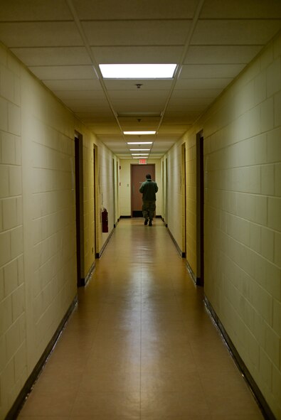 A 51 st Logistic Readienss Squadron Airman inspects the rooms in a collective protective shelter facility building 930 Jan. 23, 2015, at Osan Air Base, Republic of Korea. The facility is important for housing forces in a contingency. (U.S. Air Force photo by Staff Sgt. Jake Barreiro)