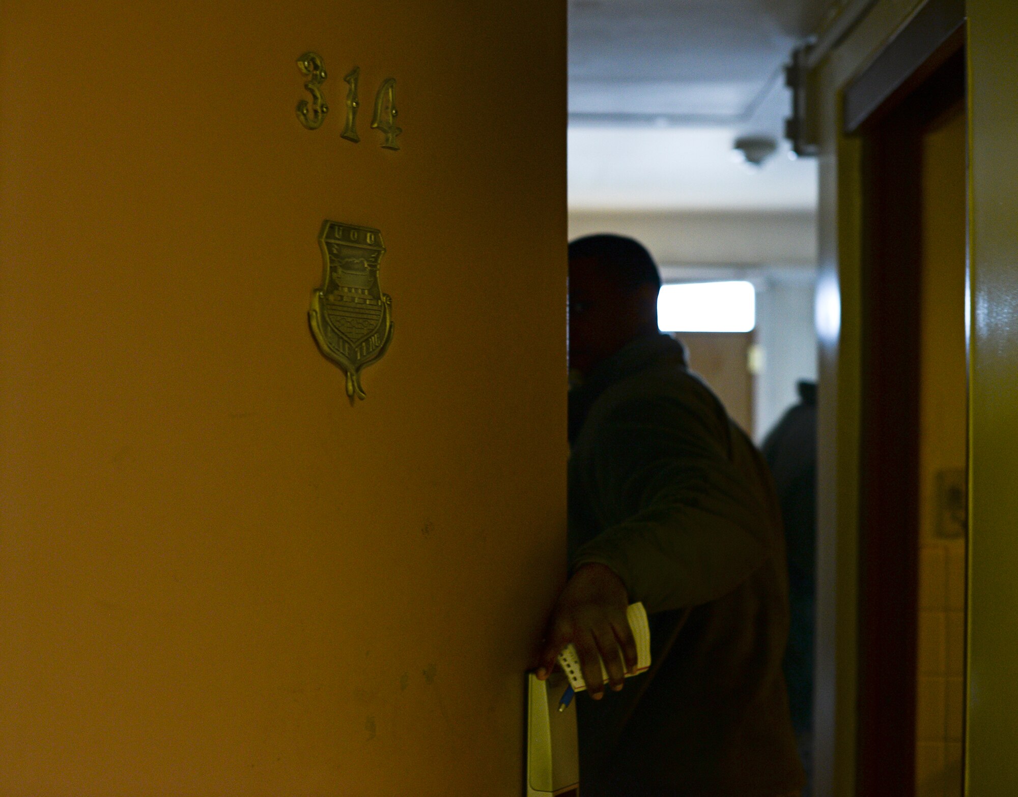 A dorm room in bulding 930 is inspected Jan. 23, 2015, at Osan Air Base, Republic of Korea. The 51st Logstic Readiness Squadron examines the rooms, noting any issues which may make them uninhabitable. (U.S. Air Force photo by Staff Sgt. Jake Barreiro)
