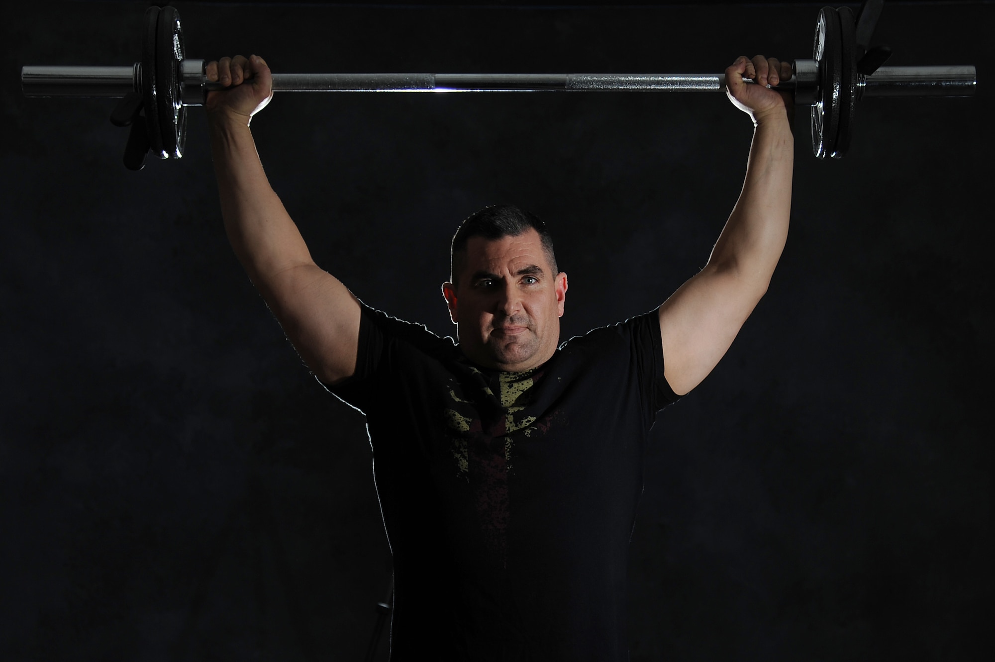 Master Sgt. Scott Stuehrenberg utilizes the fitness center to work on his powerlifting ability.  In addition to going to the gym, Stuehrenberg cooks his meals at home and calculates the nutritional value.  Stuehrenberg is a 618th Air and Space Operations global operations manager.  (U.S. Air Force photo by Staff Sgt. Maria Bowman)